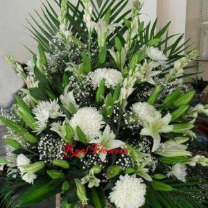 Surprise with white flowers basket in Dubai