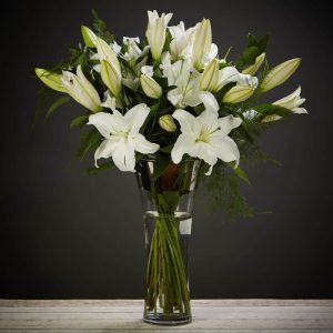 respectful congratulation of white lilies vase