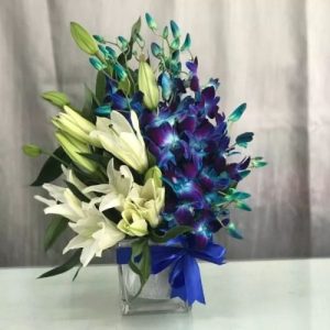 blue orchids white lilies