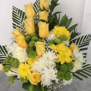 Mix flowers in yellow white and green