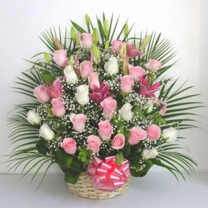 Mix of Roses and Lilies in a Basket Arrangement